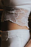 Détail couture robe de mariée deux pièces