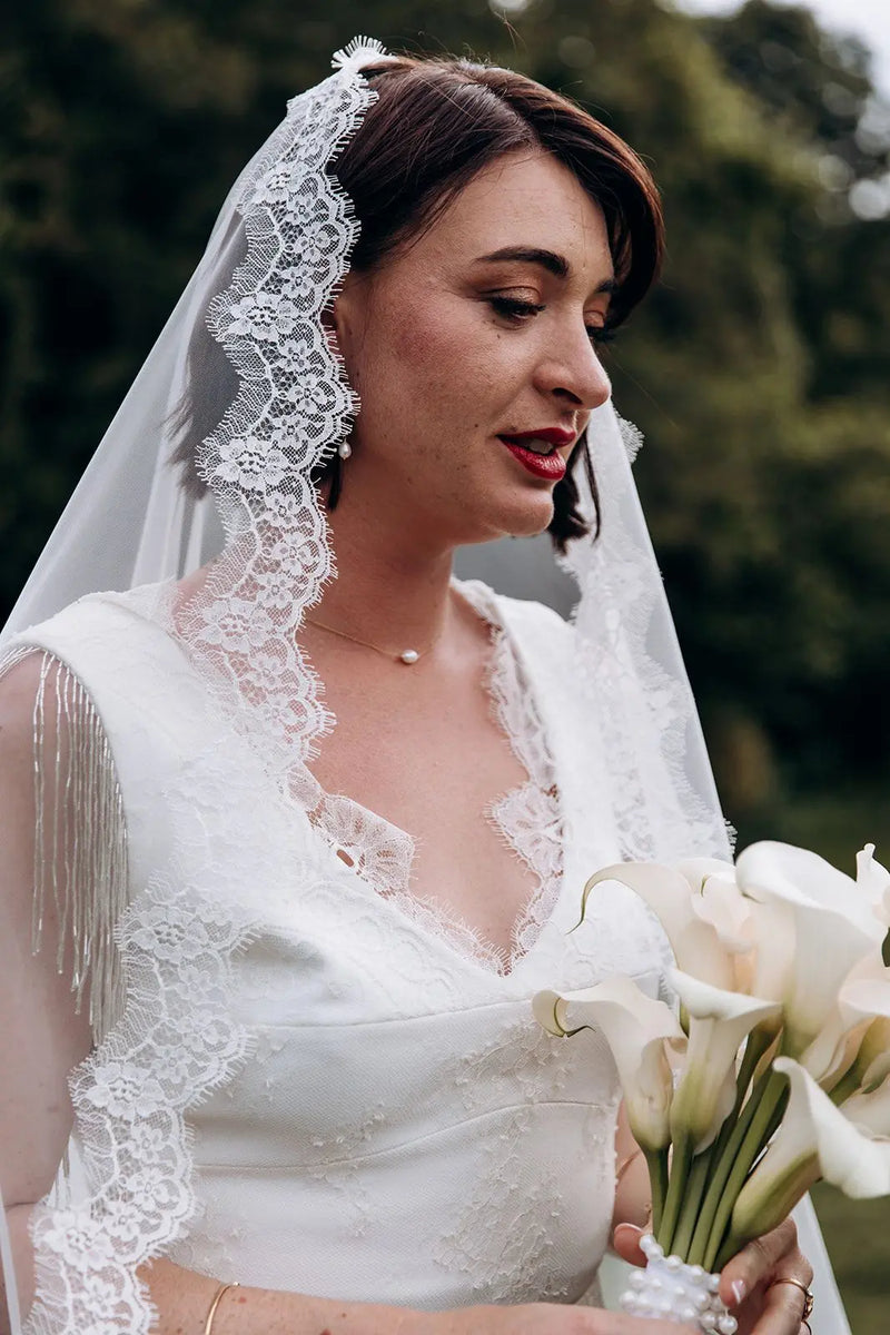 Long voile en dentelle de notre mariée 